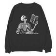 Hilarious Skeleton Holding a Book And Laughing Gothic Unisex Sweatshirt Hilarious Skeleton Holding a Book And Laughing Gothic Unisex Sweatshirt