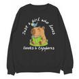 Just a Girl Who Loves Books And Capybaras Unisex Sweatshirt Just a Girl Who Loves Books And Capybaras Unisex Sweatshirt