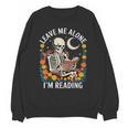 Leave Me Alone Skeleton Reading Book Floral Moon Librarian Unisex Sweatshirt