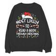 Most Likely To Read A Book Through Christmas Xmas Unisex Sweatshirt Most Likely To Read A Book Through Christmas Xmas Unisex Sweatshirt
