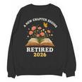 A New Chapter Begins Retired 2026 Floral Book Butterfly Tee Unisex Sweatshirt A New Chapter Begins Retired 2026 Floral Book Butterfly Tee Unisex Sweatshirt