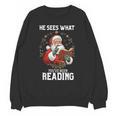 He Sees What You'Ve Been Reading Santa Book Lover Unisex Sweatshirt