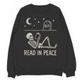 Skeleton Read In Peace Halloween Book Graphic Bookish Unisex Sweatshirt Skeleton Read In Peace Halloween Book Graphic Bookish Unisex Sweatshirt