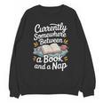 Somewhere Between a Book And a Nap – Cozy Reading Unisex Sweatshirt Somewhere Between a Book And a Nap – Cozy Reading Unisex Sweatshirt