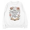 She Blooms Among The Pages Women Mom Wife Floral Book Lover Premium Tri-Blend Unisex Sweatshirt She Blooms Among The Pages Women Mom Wife Floral Book Lover Premium Tri-Blend Unisex Sweatshirt