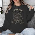 A Book A Day Keeps Reality Away Unisex Sweatshirt