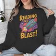 Book Lover Kids And Adults Reading Is a Blast Rocket Ship Unisex Sweatshirt