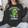 Books Never Go Extinct Reading Dinosaur Bookish Nerdy Unisex Sweatshirt Books Never Go Extinct Reading Dinosaur Bookish Nerdy Unisex Sweatshirt