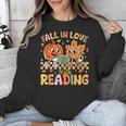 Fall In Love With Reading Autumn Pumpkin Teacher Book Lover Unisex Sweatshirt Fall In Love With Reading Autumn Pumpkin Teacher Book Lover Unisex Sweatshirt