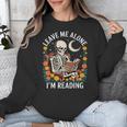 Leave Me Alone Skeleton Reading Book Floral Moon Librarian Unisex Sweatshirt
