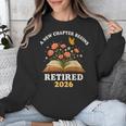 A New Chapter Begins Retired 2026 Floral Book Butterfly Tee Unisex Sweatshirt A New Chapter Begins Retired 2026 Floral Book Butterfly Tee Unisex Sweatshirt