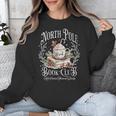North Pole Book Club Hot Cocoa Served Daily Unisex Sweatshirt North Pole Book Club Hot Cocoa Served Daily Unisex Sweatshirt