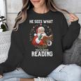 He Sees What You'Ve Been Reading Santa Book Lover Unisex Sweatshirt
