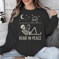 Skeleton Read In Peace Halloween Book Graphic Bookish Unisex Sweatshirt Skeleton Read In Peace Halloween Book Graphic Bookish Unisex Sweatshirt