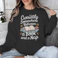 Somewhere Between a Book And a Nap – Cozy Reading Unisex Sweatshirt Somewhere Between a Book And a Nap – Cozy Reading Unisex Sweatshirt