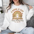 A Book A Day Keeps Reality Away Reading Unisex Sweatshirt A Book A Day Keeps Reality Away Reading Unisex Sweatshirt