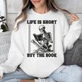 Life Is Short Buy The Book Skeleton Book Lover Reading Unisex Sweatshirt Life Is Short Buy The Book Skeleton Book Lover Reading Unisex Sweatshirt