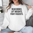 Read Books Lift Weights Fight Fascists Premium Tri-Blend Unisex Sweatshirt