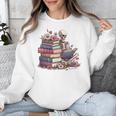 Reading A Book Per Day Keeps Reality Away Skeleton Books Unisex Sweatshirt Reading A Book Per Day Keeps Reality Away Skeleton Books Unisex Sweatshirt