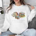 I Rescue Book Trapped In The Bookstore I'm Not A Hoarder Premium Tri-Blend Unisex Sweatshirt I Rescue Book Trapped In The Bookstore I'm Not A Hoarder Premium Tri-Blend Unisex Sweatshirt