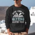 Buying A Book And Getting A Little Treat Unisex Sweatshirt