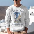 A Book A Day Keeps Reality Away Premium Tri-Blend Unisex Sweatshirt