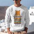 Cute Orange Tabby Cat Reading On Pile Of Books Unisex Sweatshirt