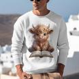 Highland Cow Reading Book Bookworm Unisex Sweatshirt