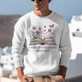 a New Chapter Begins Retired 2025 Floral Book Retirement Unisex Sweatshirt a New Chapter Begins Retired 2025 Floral Book Retirement Unisex Sweatshirt