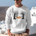 Skeleton Reading Book In Hammock Halloween Reader Unisex Sweatshirt