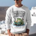 Unearth a Story Frog Reading a Book Summer 2026 Premium Tri-Blend Unisex Sweatshirt Unearth a Story Frog Reading a Book Summer 2026 Premium Tri-Blend Unisex Sweatshirt