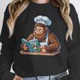 Bigfoot Reading a Cookbook Unisex Sweatshirt