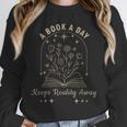 A Book A Day Keeps Reality Away Unisex Sweatshirt