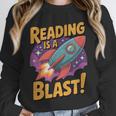 Book Lover Kids And Adults Reading Is a Blast Rocket Ship Unisex Sweatshirt