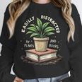 Easily Distracted By Plants And Books Unisex Sweatshirt