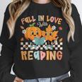 Fall In Love With Reading Thanksgiving Pumpkin Book Lover Unisex Sweatshirt Fall In Love With Reading Thanksgiving Pumpkin Book Lover Unisex Sweatshirt
