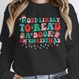 Groovy Christmas Most Likely To Read A Book On Christmas Unisex Sweatshirt Groovy Christmas Most Likely To Read A Book On Christmas Unisex Sweatshirt