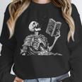Hilarious Skeleton Holding a Book And Laughing Gothic Unisex Sweatshirt Hilarious Skeleton Holding a Book And Laughing Gothic Unisex Sweatshirt