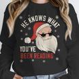 He Knows What You'Ve Been Reading Book Lover Women Santa Unisex Sweatshirt He Knows What You'Ve Been Reading Book Lover Women Santa Unisex Sweatshirt