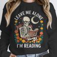 Leave Me Alone Skeleton Reading Book Floral Moon Librarian Unisex Sweatshirt