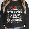 Most Likely To Read A Book On Christmas Matching Family Unisex Sweatshirt