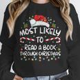 Most Likely To Read A Book Through Christmas Xmas Unisex Sweatshirt Most Likely To Read A Book Through Christmas Xmas Unisex Sweatshirt