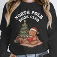 North Pole Book Club Gingerbread Christmas Reading Unisex Sweatshirt North Pole Book Club Gingerbread Christmas Reading Unisex Sweatshirt