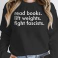 Read Books Lift Weights Fight Fascists Reading Activism Meme Unisex Sweatshirt Read Books Lift Weights Fight Fascists Reading Activism Meme Unisex Sweatshirt