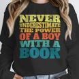 Retro Never Underestimate The Power Of a Boy With a Book Unisex Sweatshirt