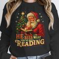 He Sees What You’Ve Been Reading Santa Book Lover Christmas Unisex Sweatshirt
