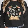 She Blooms Among The Pages Women Mom Wife Floral Book Quote Unisex Sweatshirt She Blooms Among The Pages Women Mom Wife Floral Book Quote Unisex Sweatshirt