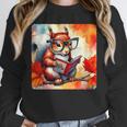 Squirrel Reading Comic Book On Autumn Branch Glasses Leaves Unisex Sweatshirt