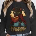 Wizard Cat Reading a Book While Crocheting Unisex Sweatshirt