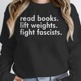 Women's Read Books Lift Weights Fight Fascists Reading Activism Meme Unisex Sweatshirt Women's Read Books Lift Weights Fight Fascists Reading Activism Meme Unisex Sweatshirt